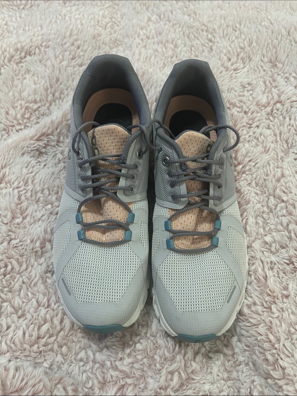 On Running Gray Sneakers with light gray and peach colors on‎ cloud shoes